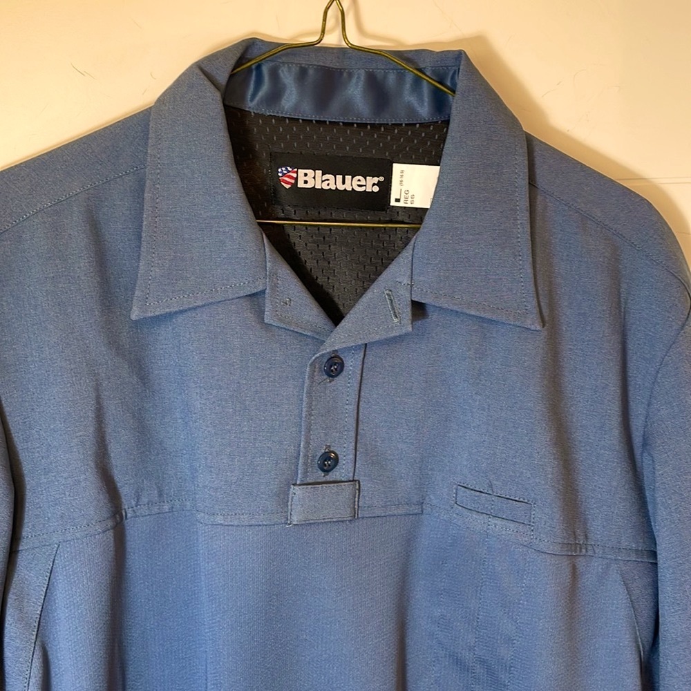 Size 16 men’s dress shirt, double penholder. Safety reflective strips.